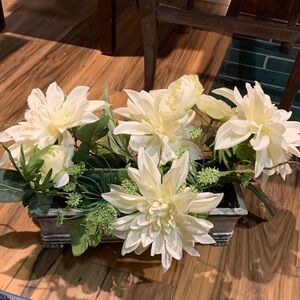 Faux flower table arrangement in aged look wooden box